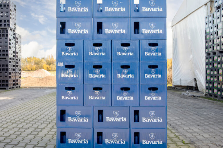 Stacked Bavaria crates at the Royal Swinkels brewery near the hot water buffer tank project