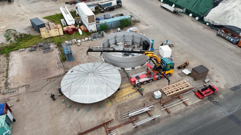 installation of stainless steel tank roof during on-site construction