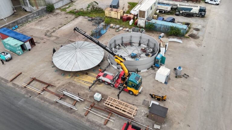 installation of stainless steel tank roof during on-site construction