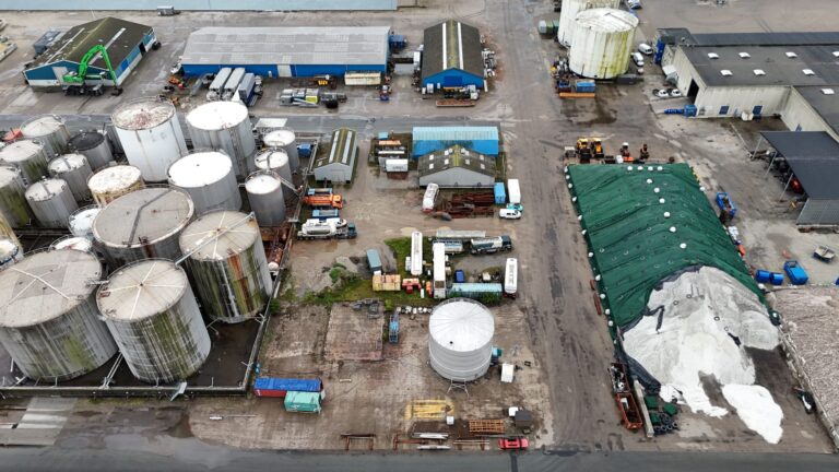 aerial view of biogas installation with stainless steel storage tanks