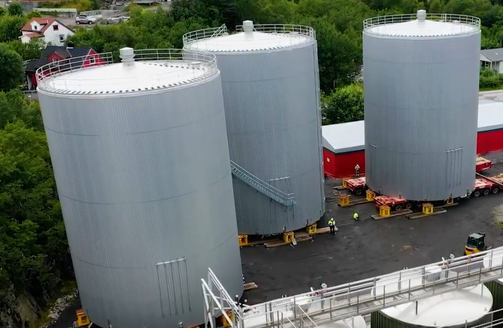 Three large fish oil storage tanks in Lean Duplex stainless steel at their final location in Norway
